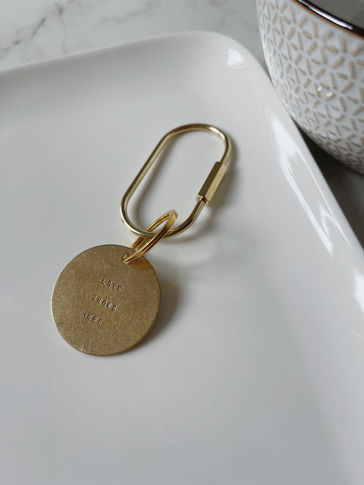 LOVE GROWS HERE Carabiner